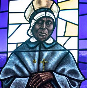 Stained glass window featuring Mother Mary Lange